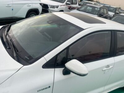 2024 Toyota Corolla 1.8 Litres Hybrid 4-cylinder Engine White Red Sedan AWD