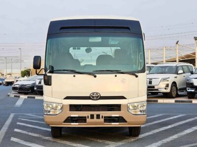 2025 Toyota Coaster 2.7L PETROL MT DUAL TONE 4 Cylinders Engine White Brown Bus