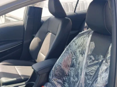 2025 Toyota Corolla 1.8 Litres 4 Cylinders Hybrid Engine White Black Sedan FWD Automatic