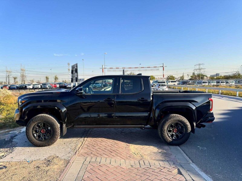 2025 Toyota Tacoma TRD Pro 2.4L i-FORCE MAX turbocharged 4-cylinder Engine Black Red Pickup