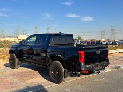 2025 Toyota Tacoma TRD Pro 2.4L i-FORCE MAX turbocharged 4-cylinder Engine Black Red Pickup