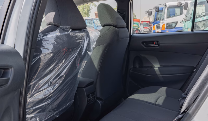 2025 Toyota Corolla Cross 2.0-liter inline 4-cylinder Hybrid​ Engine White Black SUV