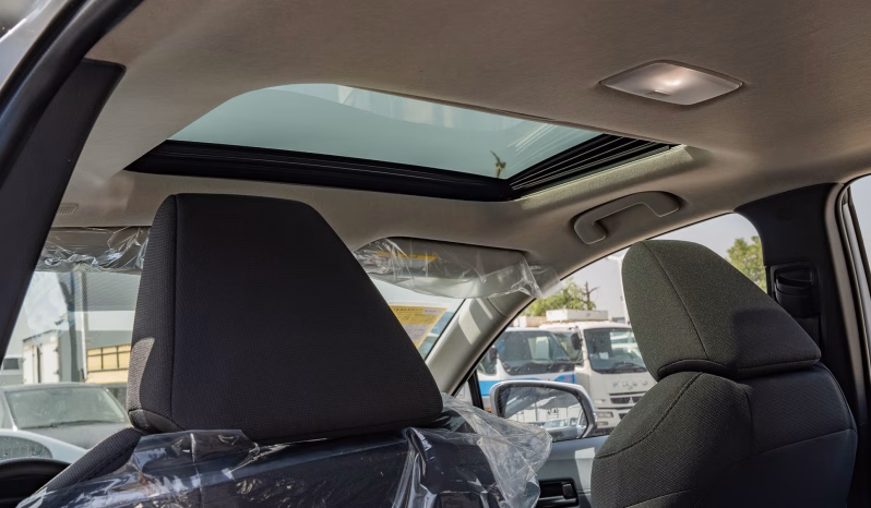 2025 Toyota Corolla Cross 2.0-liter inline 4-cylinder Hybrid​ Engine White Black SUV