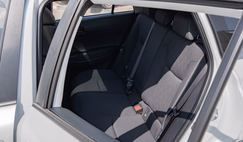 2025 Toyota Corolla Cross 2.0-liter inline 4-cylinder Hybrid​ Engine White Black SUV