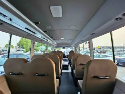 2025 Toyota Coaster 2.7L PETROL MT DUAL TONE 4 Cylinders Engine White Brown Bus