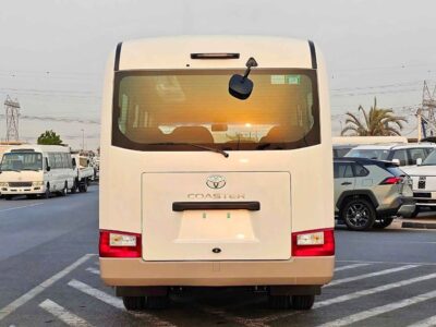 2025 Toyota Coaster 2.7L PETROL MT DUAL TONE 4 Cylinders Engine White Brown Bus