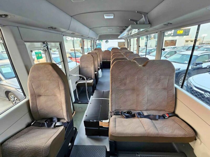 2025 Toyota Coaster 2.7L PETROL MT DUAL TONE 4 Cylinders Engine White Brown Bus