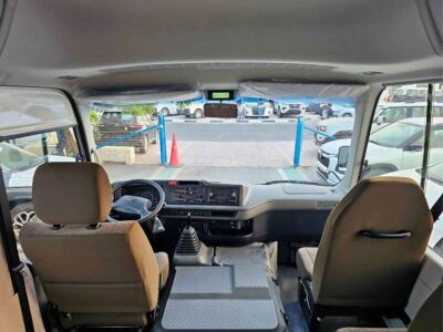 2025 Toyota Coaster 2.7L PETROL MT DUAL TONE 4 Cylinders Engine White Brown Bus