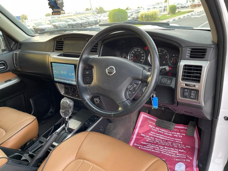 2013 Nissan Patrol ST Safari 3.0L 4 Cylinders Turbo Diesel White Tan SUV 4x4