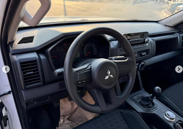 2025 Mitsubishi L200 2.4L 4-cylinder intercooled Turbo Diesel Engine White Black Pickup Truck