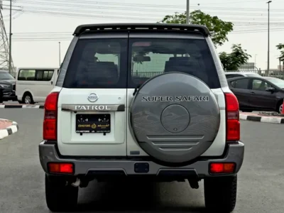 2024 Nissan Patrol Safari Super Safari Al Ostoura 4.8L 6 Cylinder Engine White Red SUV