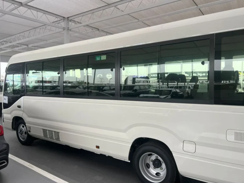 2026 Toyota Coaster 4.2 Litres V6 DSL Engine MT White Brown Bus GCC