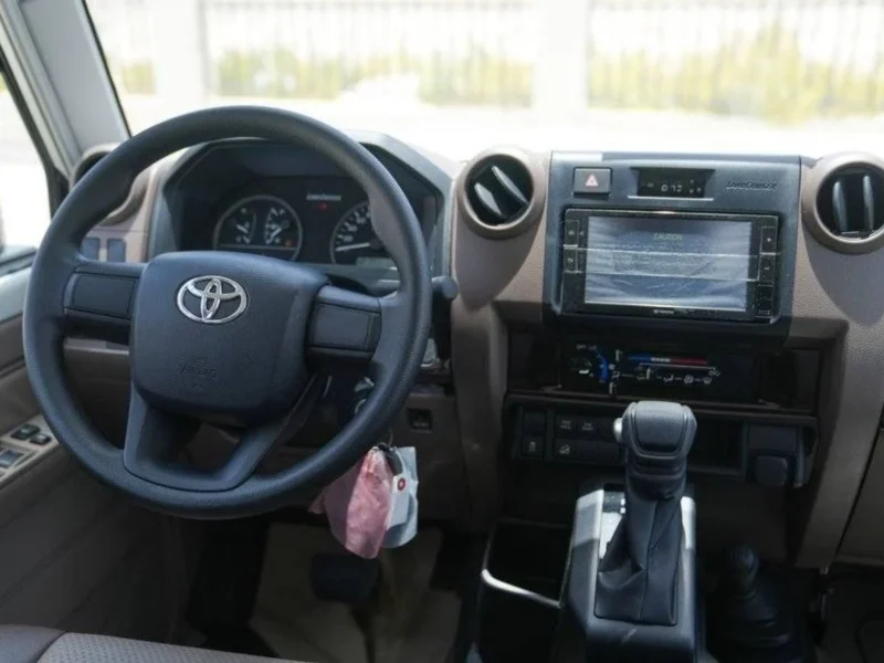 2025 Toyota Land Cruiser LC 79 DC 2.8 L turbocharged inline‑4 Diesel White Brown Pickup Truck