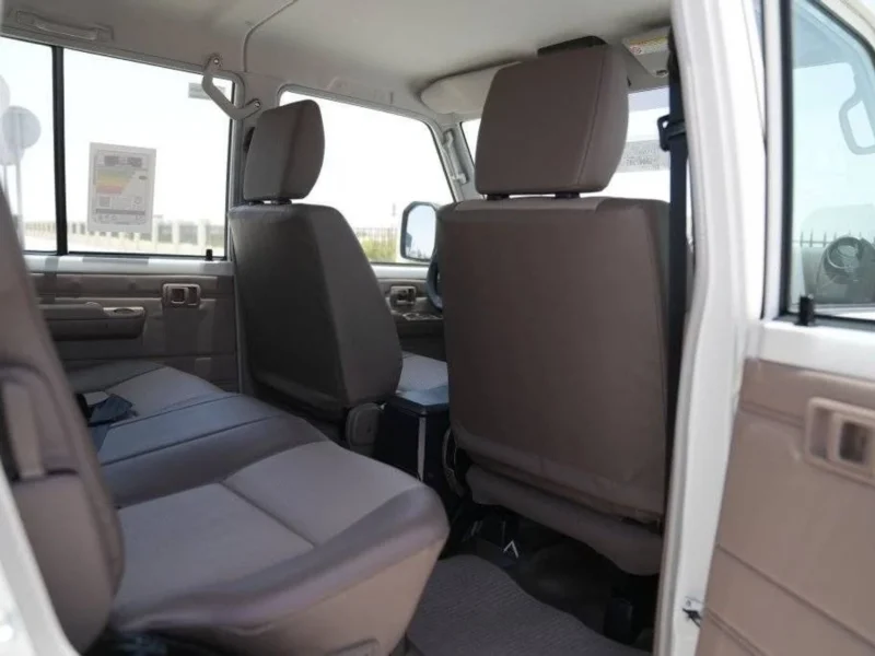 2025 Toyota Land Cruiser LC 79 DC 2.8 L turbocharged inline‑4 Diesel White Brown Pickup Truck