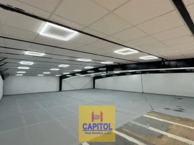 Expansive and Functional Warehouse Space Built for Practicality Offering Wide Entry Access