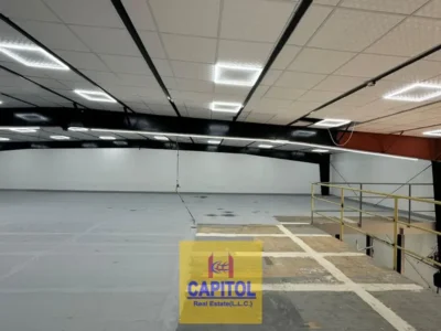 Expansive and Functional Warehouse Space Built for Practicality Offering Wide Entry Access