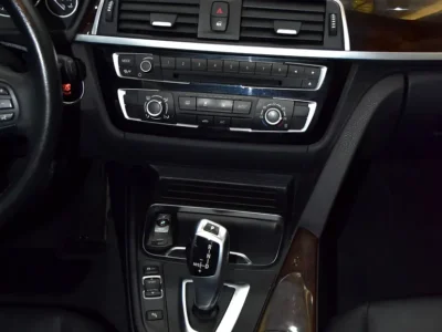 2016 BMW 3-Series 318i 1.5-liter Turbocharged 3-cylinder Engine Brown Black Sedan GCC
