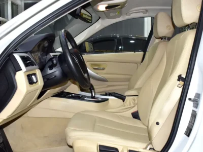 2016 BMW 3-Series 318i 1.5-liter Turbocharged 3-cylinder Engine White Beige Sedan GCC