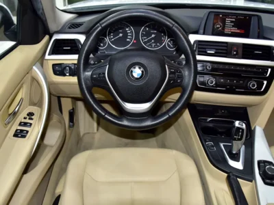 2016 BMW 3-Series 318i 1.5-liter Turbocharged 3-cylinder Engine White Beige Sedan GCC