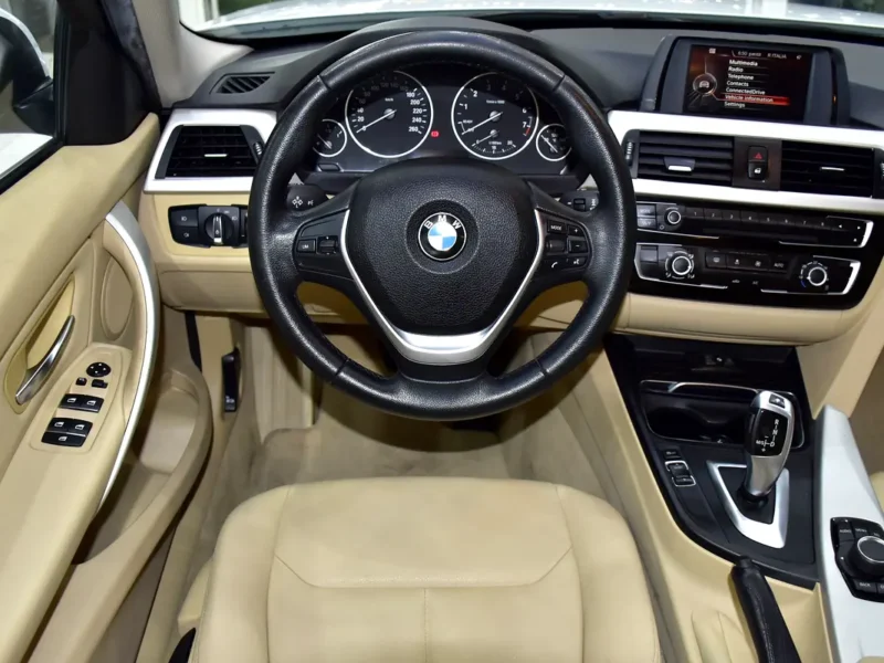 2016 BMW 3-Series 318i 1.5-liter Turbocharged 3-cylinder Engine White Beige Sedan GCC