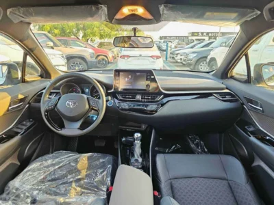 2023 Toyota C-HR LUXURY 1.8 Litres 4 Cylinders HYBRID Engine White Grey SUV GCC Specs