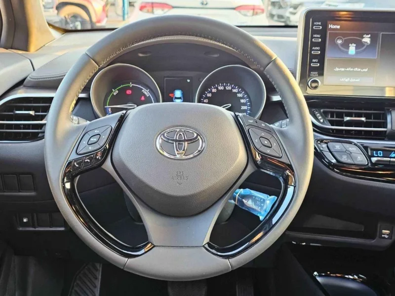 2023 Toyota C-HR LUXURY 1.8 Litres 4 Cylinders HYBRID Engine White Grey SUV GCC Specs