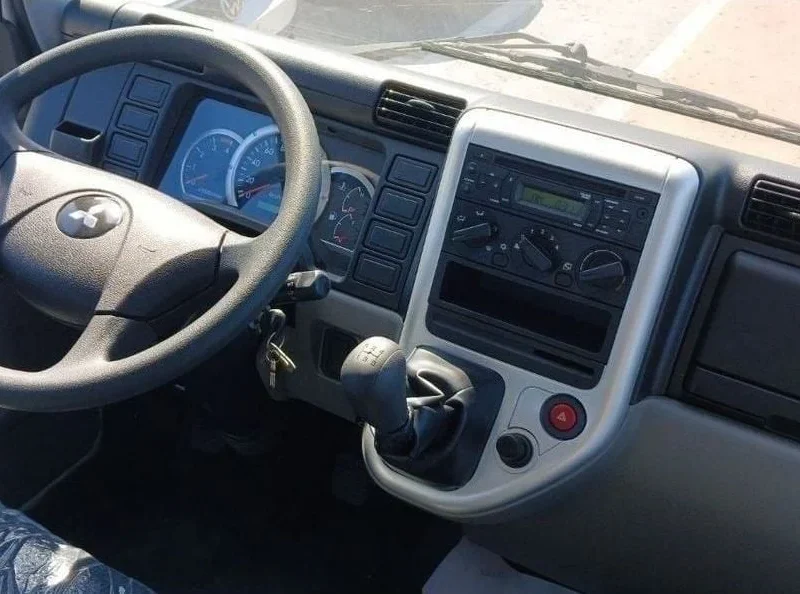 2025 Mitsubishi Canter Cargo Body 4.2L 6 Cylinders Diesel Engine MT White Black Truck GCC