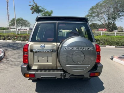 2024 Nissan Patrol Super Safari 4.8 Litres 6-Cylinder In-line Gold Red SUV GCC Specs