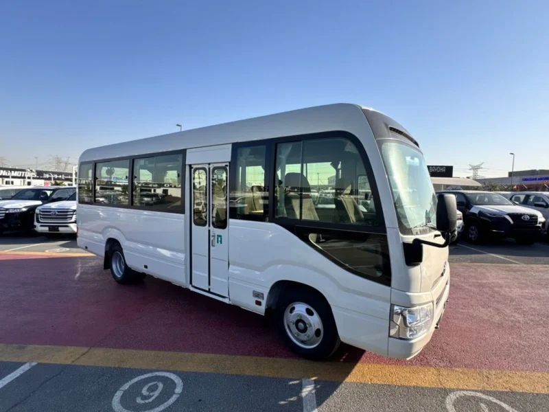 2026 TOYOTA COASTER HIROOF 4.0L DIESEL M/T 22 SEATER White Grey BUS GCC Specs