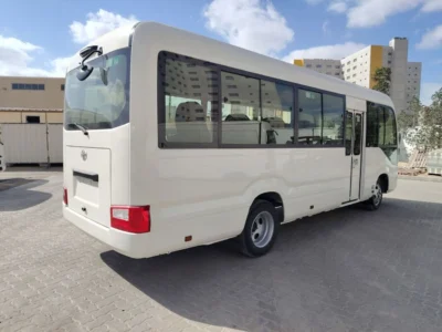 2026 TOYOTA COASTER HIROOF 2.8L DIESEL A/T 22 SEATER LUGGAGE RACK White Grey Bus