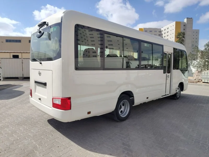 2026 TOYOTA COASTER HIROOF 2.8L DIESEL A/T 22 SEATER LUGGAGE RACK White Grey Bus