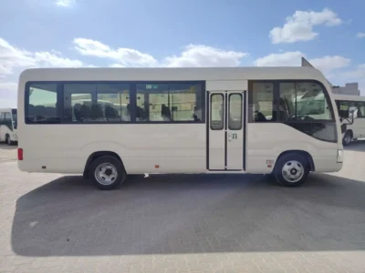 2026 TOYOTA COASTER HIROOF 2.8L DIESEL A/T 22 SEATER LUGGAGE RACK White Grey Bus
