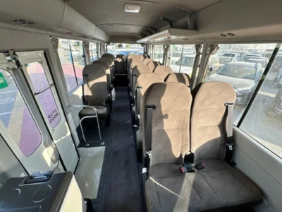 2026 TOYOTA COASTER HIROOF 4.0L DIESEL M/T 22 SEATER White Grey BUS GCC Specs