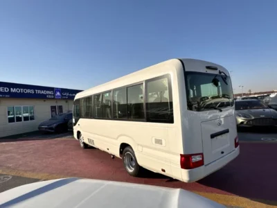 2026 TOYOTA COASTER HIROOF 4.0L DIESEL M/T 22 SEATER White Grey BUS GCC Specs