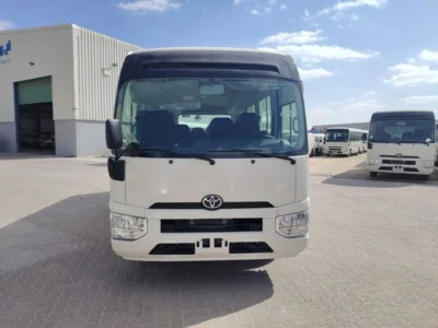 2026 TOYOTA COASTER HIROOF 2.8L DIESEL A/T 22 SEATER LUGGAGE RACK White Grey Bus