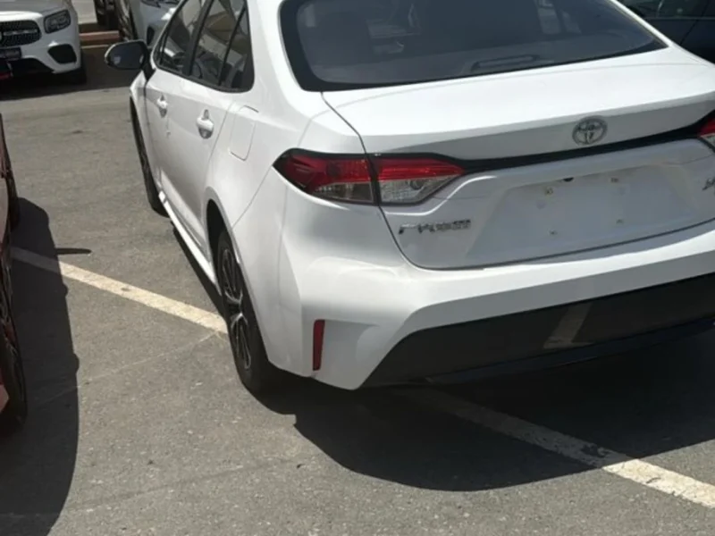 2024 Toyota Corolla 1.2 Litres 4 Cylinders Hybrid Engine White Black Sedan Automatic