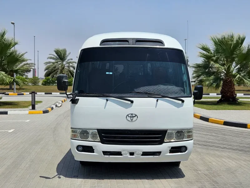 2012 Toyota Coaster 4 Cylinders Diesel Engine White Maroon Van MT Very Neat and Clean 30 Seater
