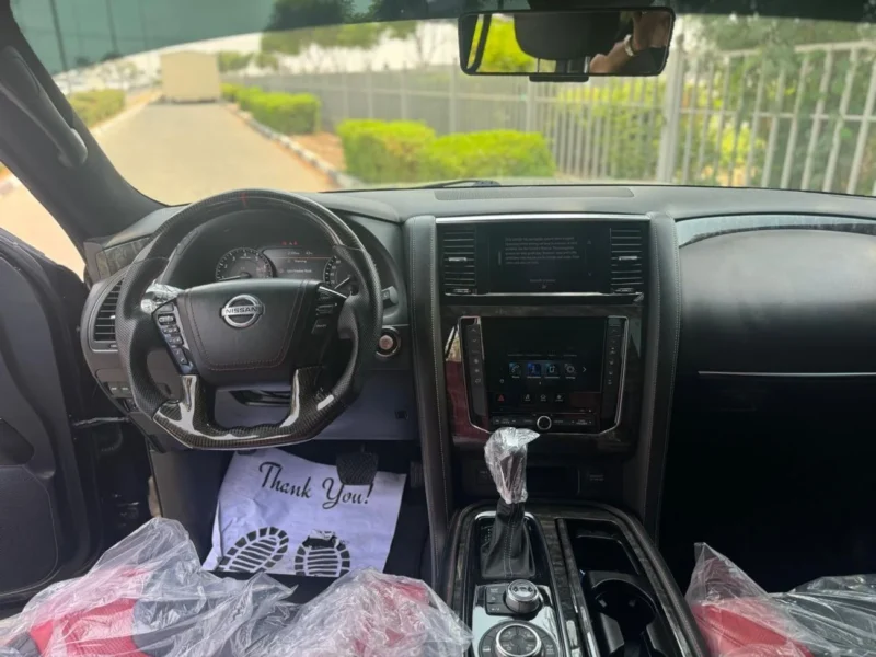 2022 Nissan Patrol LE T2 5.6 Liters 8 Cylinders Petrol Engine Black Red SUV GCC Specs