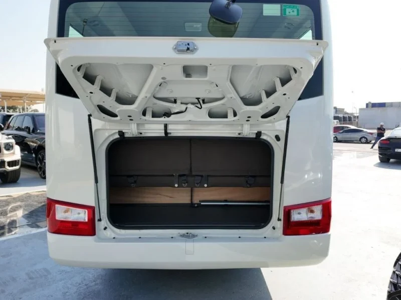 2025 Toyota Coaster High Roof 4.0L Turbo Diesel 4 Cylinders White Brown Bus GCC Specs