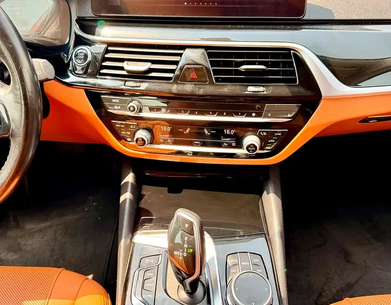 2023 BMW 5-Series 520i 2.0 Litres 4 Cylinders Petrol Engine Black Yellow Hatchback GCC Specs