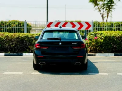 2023 BMW 5-Series 520i 2.0 Litres 4 Cylinders Petrol Engine Black Yellow Hatchback GCC Specs