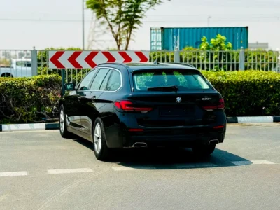 2023 BMW 5-Series 520i 2.0 Litres 4 Cylinders Petrol Engine Black Yellow Hatchback GCC Specs