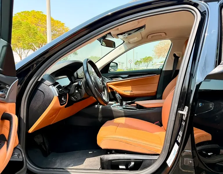 2023 BMW 5-Series 520i 2.0 Litres 4 Cylinders Petrol Engine Black Yellow Hatchback GCC Specs
