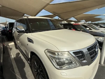 2015 Nissan Patrol LE Platinum 5.6 Litres 8 Cylinders Petrol Engine White Tan SUV GCC Specs