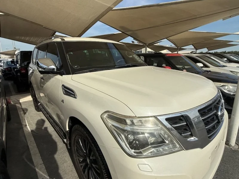 2015 Nissan Patrol LE Platinum 5.6 Litres 8 Cylinders Petrol Engine White Tan SUV GCC Specs