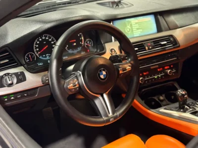 2014 BMW M5 Standard 4.4L Twin-Turbo V8 Engine Black Orange High-Performance Luxury Sedan