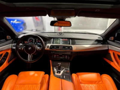 2014 BMW M5 Standard 4.4L Twin-Turbo V8 Engine Black Orange High-Performance Luxury Sedan