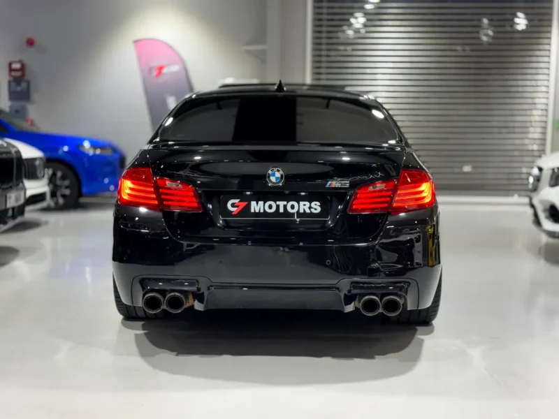 2014 BMW M5 Standard 4.4L Twin-Turbo V8 Engine Black Orange High-Performance Luxury Sedan